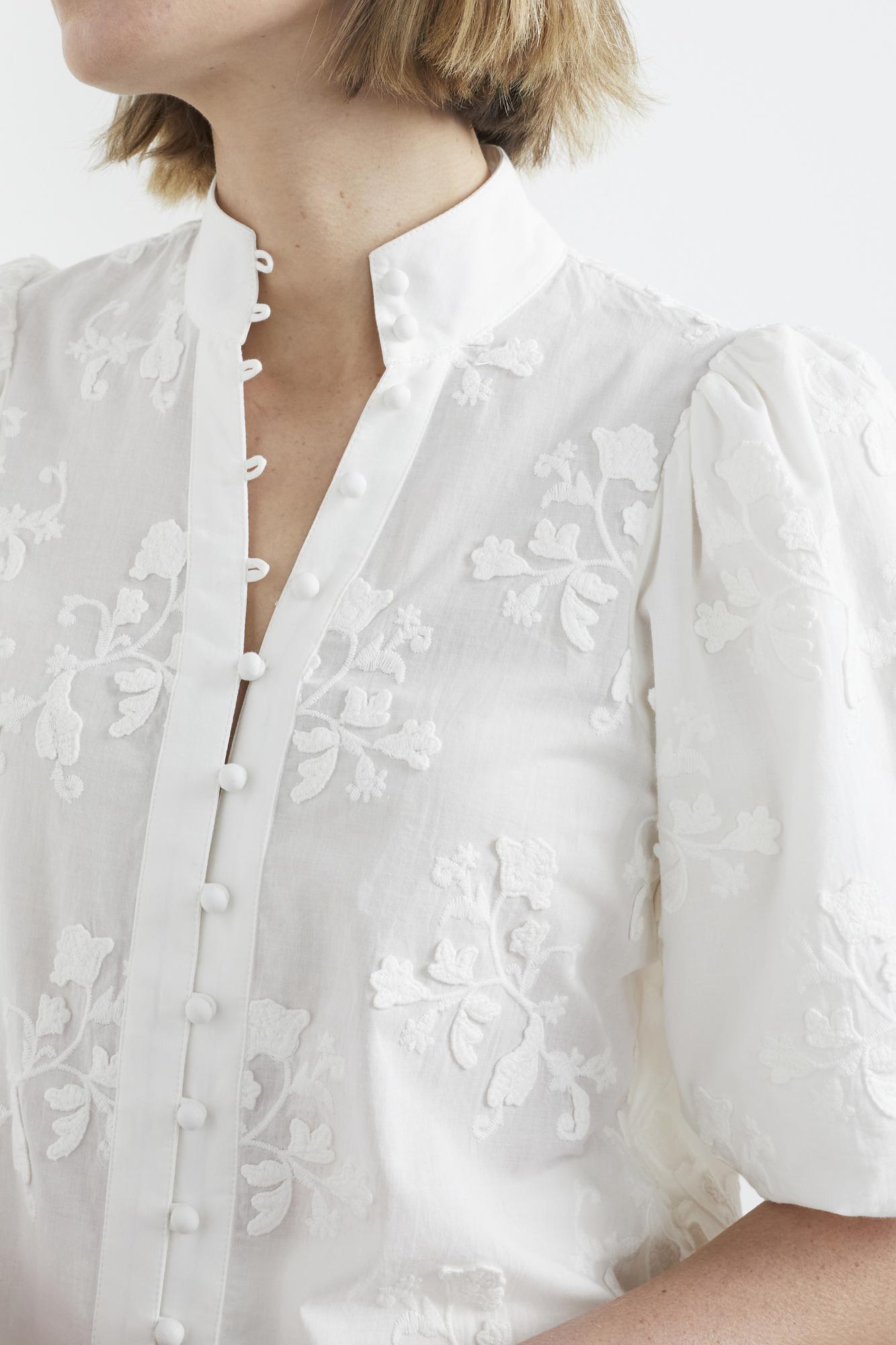 linen blouse with bespoke raised embroidery